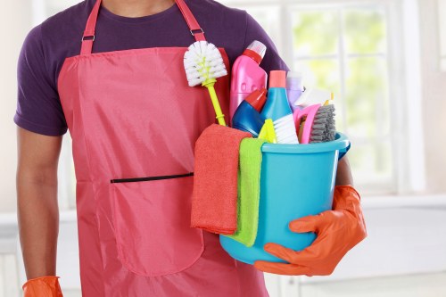 Satisfied customer with a clean and organized home after professional cleaning