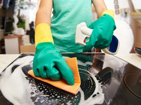 Satisfied customer enjoying a spotless bathroom after Jack Cleaners' service